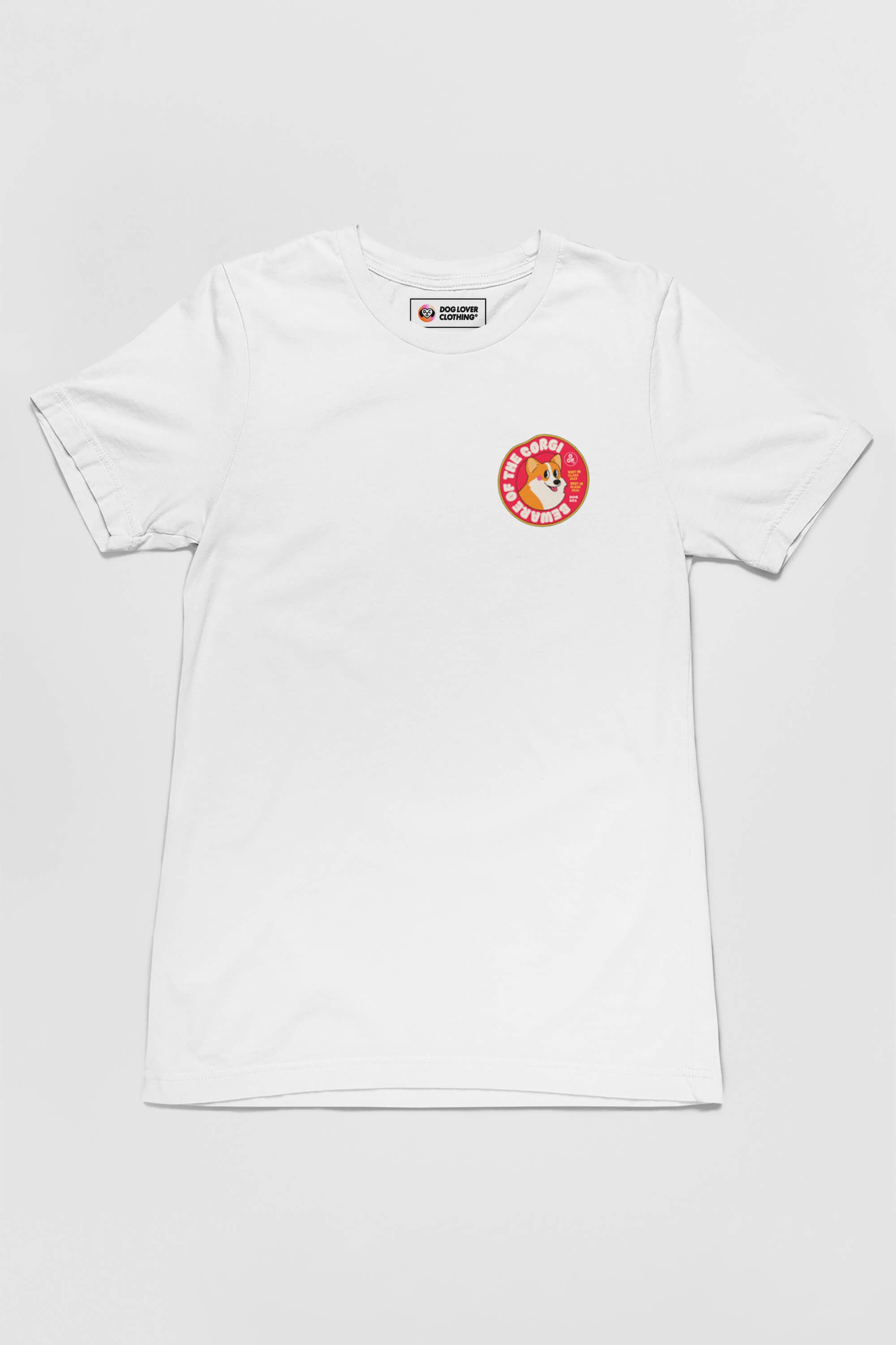 The Dogloverclothing.com Beware of the Corgi Supreme unisex t-shirt showcases a cheerful cartoon duck with 100% DUCK EGG on the left chest, surrounded by a red border. Crafted from ultra-comfy fabric, it lies flat against a gray background—ideal for Corgi enthusiasts who enjoy unique designs.