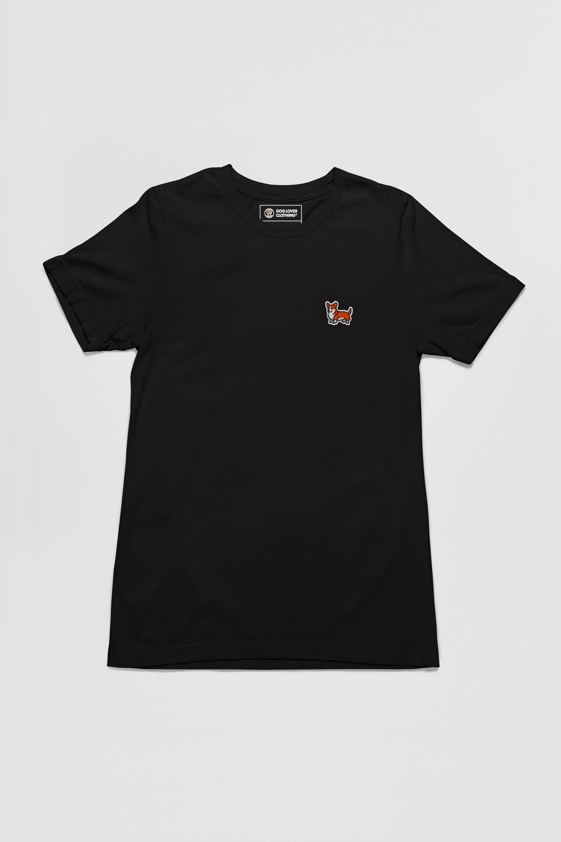 Introducing the Corgi Tail Wagger Unisex T-Shirt by Dogloverclothing.com: A black tee with a small embroidered long-tailed Corgi patch on the left chest. Ideal for Corgi fans, this shirt is showcased against a crisp white background.