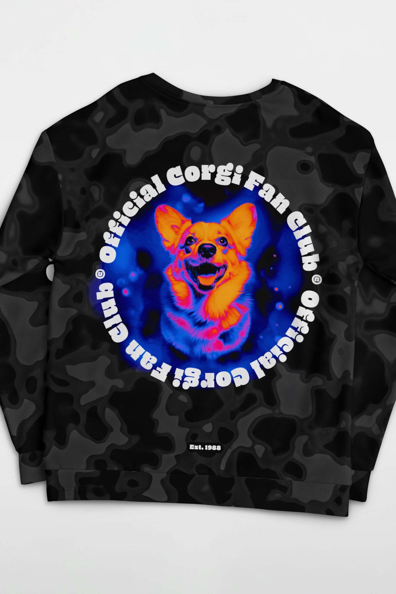 The Official Corgi Fan Club© Elite Camo Sweatshirt by Dogloverclothing.com is an eco-friendly black camo top with a vibrant corgi illustration, Official Corgi Fan Club in white, and Est. 1988 at the bottom. Made from recycled materials.