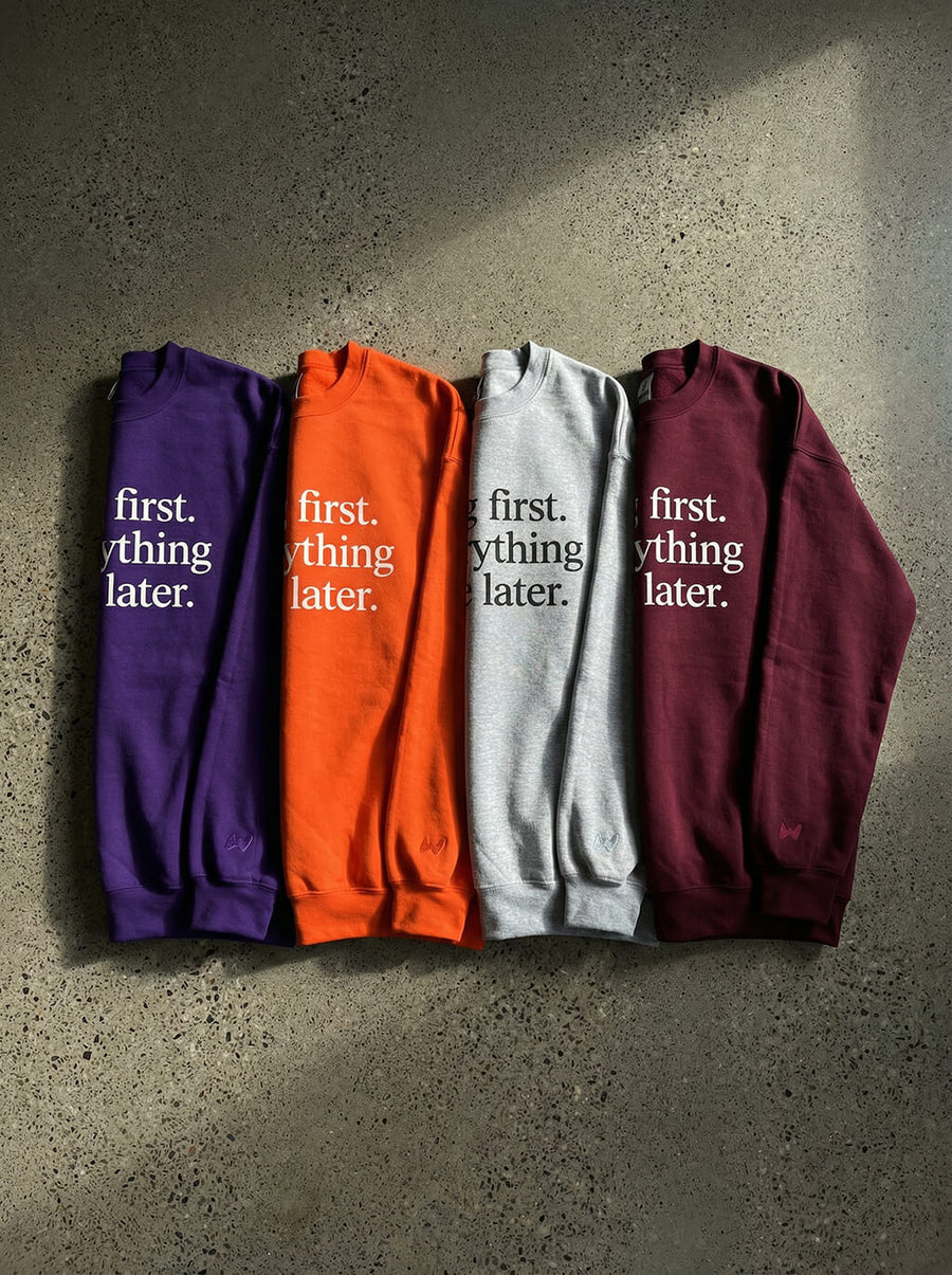 Dog First Statement Sweatshirts from WOOF laid flat in several colours