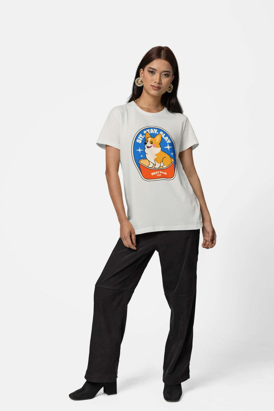 Person in the light grey Best Dog T-Shirt from WOOF with black trousers and boots