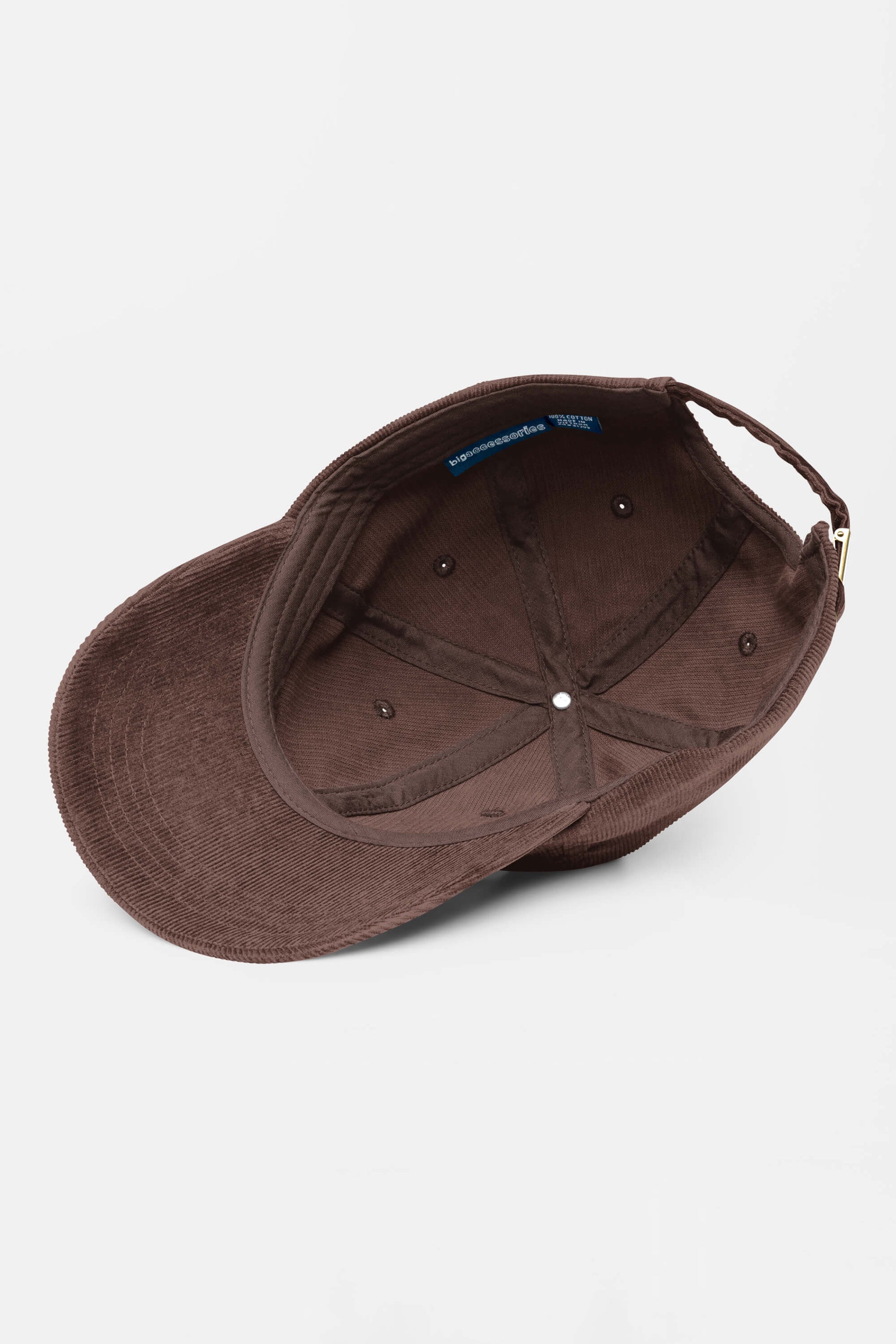 The Limited Dog Lover Corduroy Cap by Dogloverclothing.com in brown is shown inside-out, highlighting its inner seams, metal eyelets, and adjustable strap for a perfect fit—all set against a clean white background.