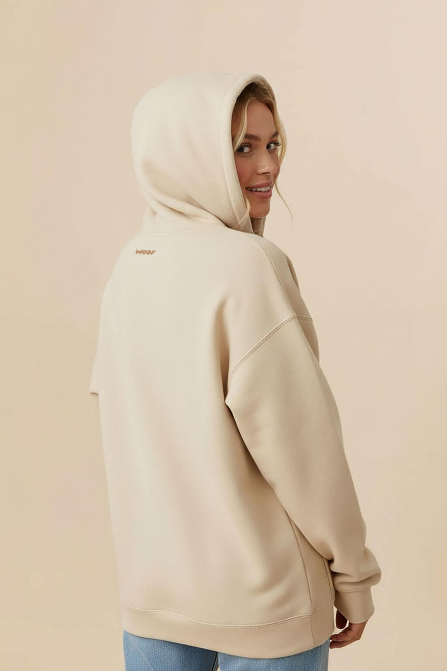 Back view of the beige Dog Mom Hoodie from WOOF