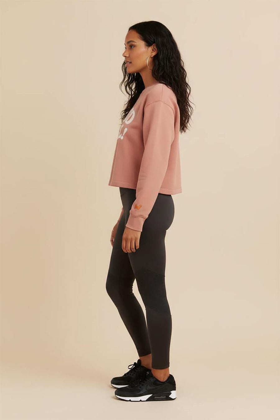 Side view of the red Good Girl Crop Sweatshirt from WOOF