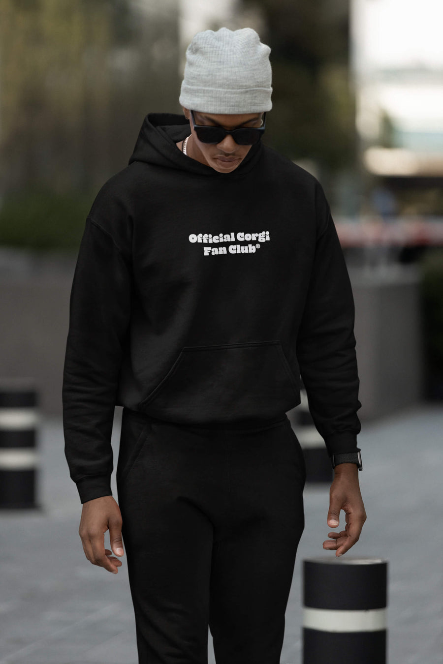Black Corgi Fan Club Hoodie from WOOF, front view with the club badge