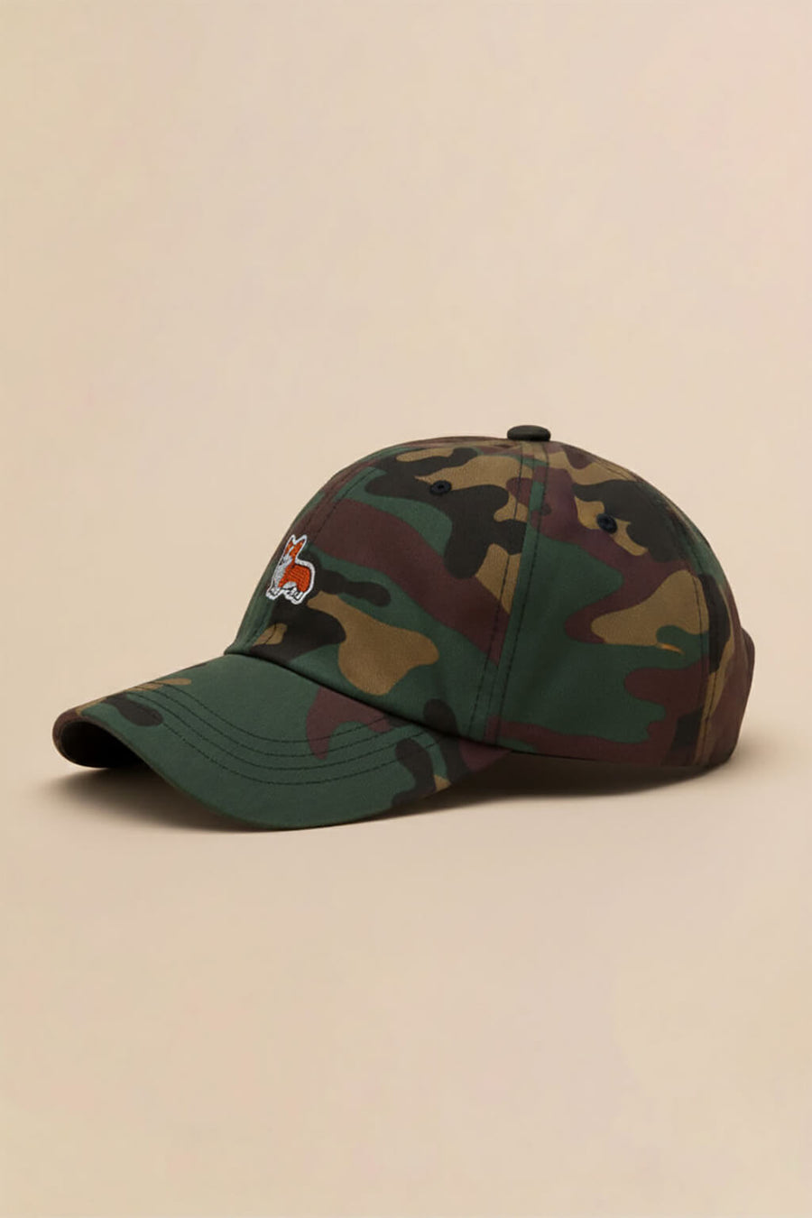 Side view of the camo Iconic Corgi Baseball Cap from WOOF