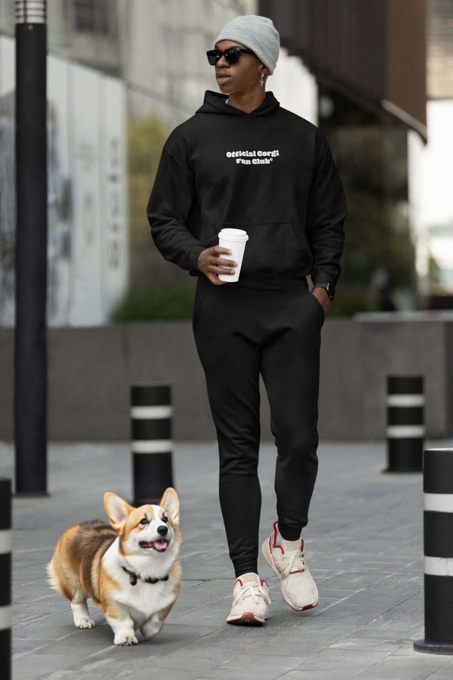 Black Corgi Fan Club Hoodie from WOOF laid flat, front view