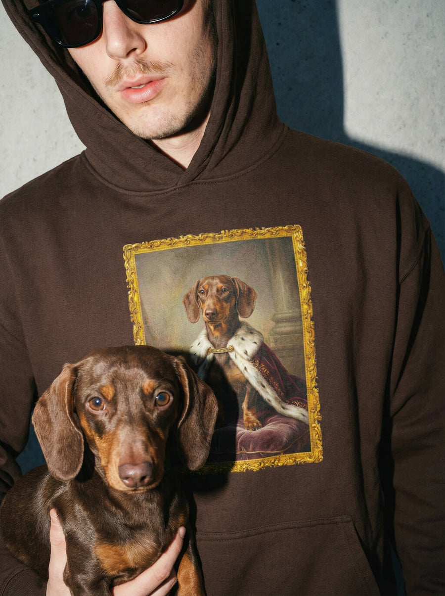 Brown custom royal dog portrait hoodie from WOOF with a framed dog painting