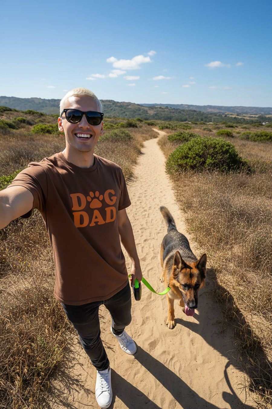 Model wearing the brown Soft Dog Dad T-Shirt from WOOF outdoors