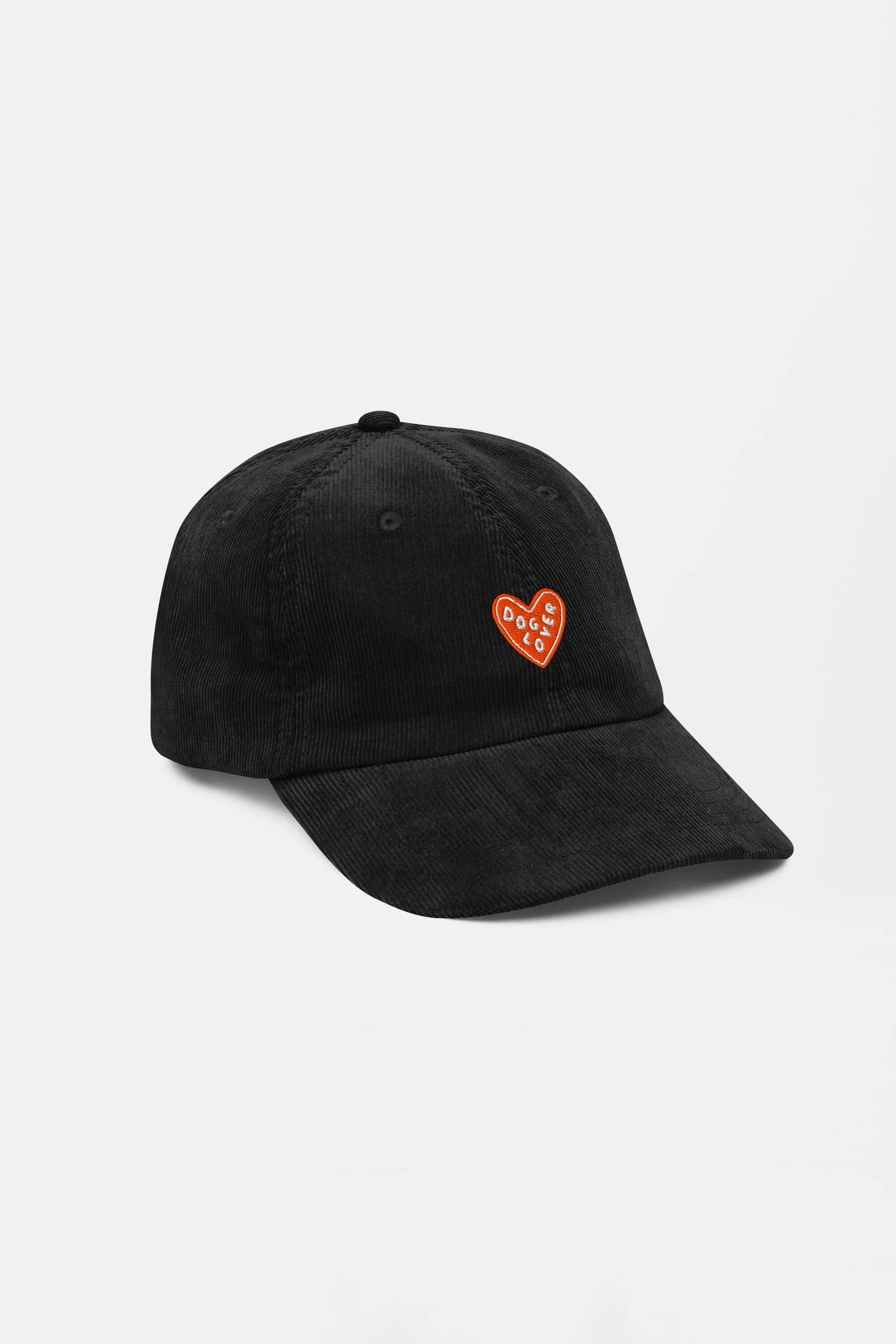 The Limited Dog Lover Corduroy Cap by Dogloverclothing.com is a black vintage-style hat with a red heart patch and white DOG CLUB text. It features an adjustable fit and is displayed on a plain white background.