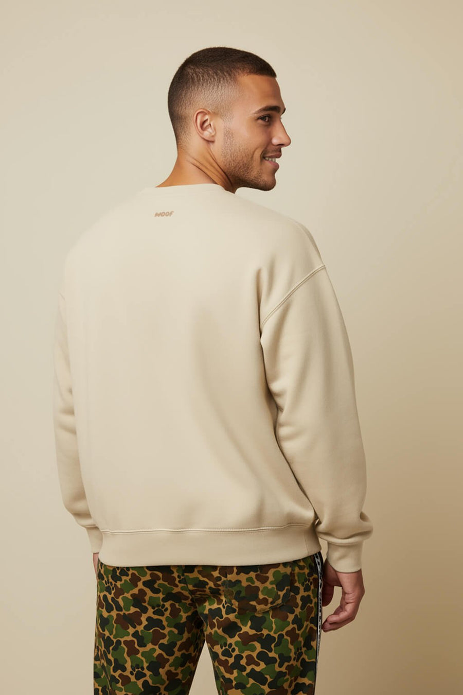 Back of the beige Can I Pet Your Dog Sweatshirt from WOOF