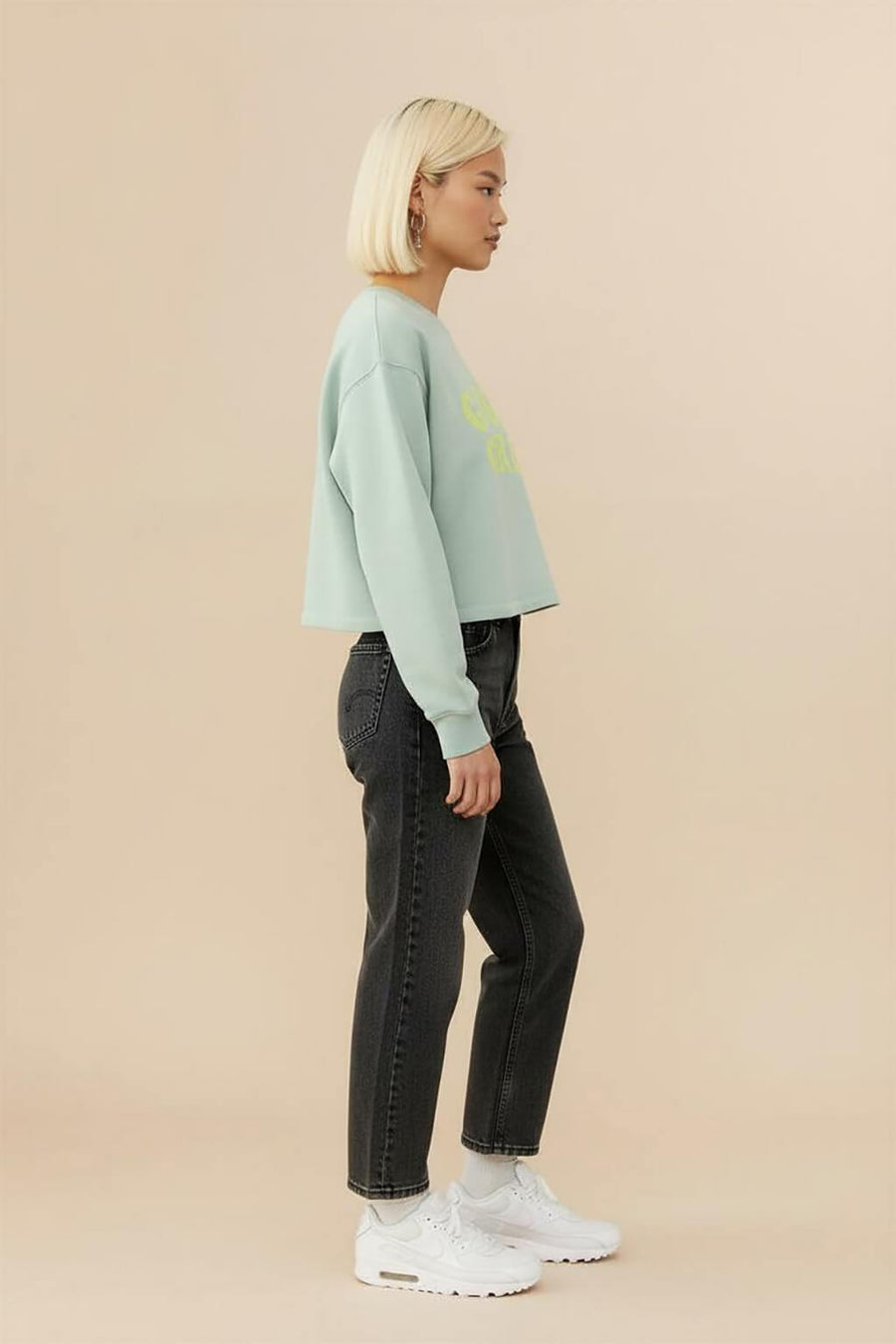 Side view of the mint green Good Girl Crop Sweatshirt from WOOF