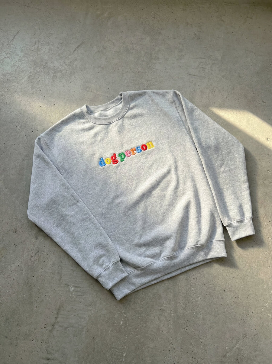 Grey Dog Person Embroidered Sweatshirt from WOOF, front view