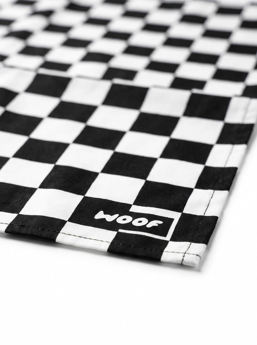 Close up of the checkered pattern on the dog bandana from WOOF