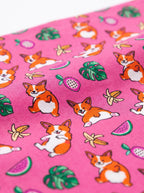 Close up of the tropical print on the pink corgi dog bandana from WOOF