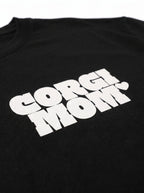 Close up of the front print on the black Corgi Mom Tribute T-Shirt from WOOF