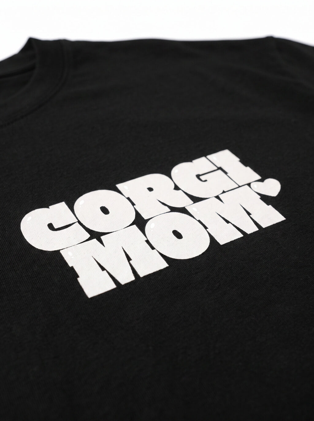 Close up of the front print on the black Corgi Mom Tribute T-Shirt from WOOF