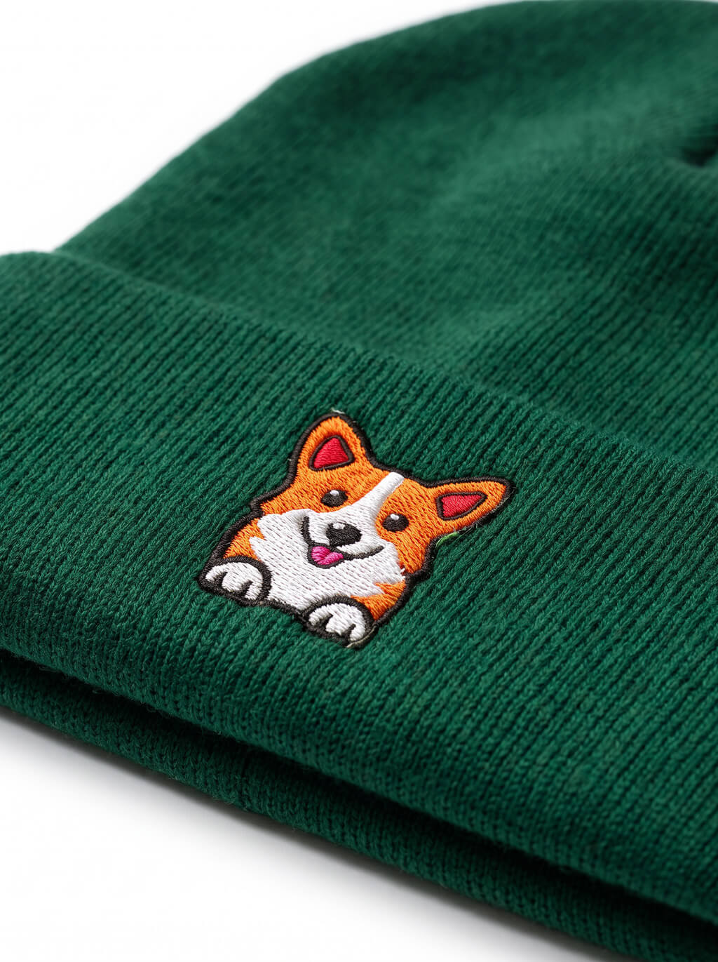Close up of the corgi patch on the green Corgi Patch Beanie from WOOF