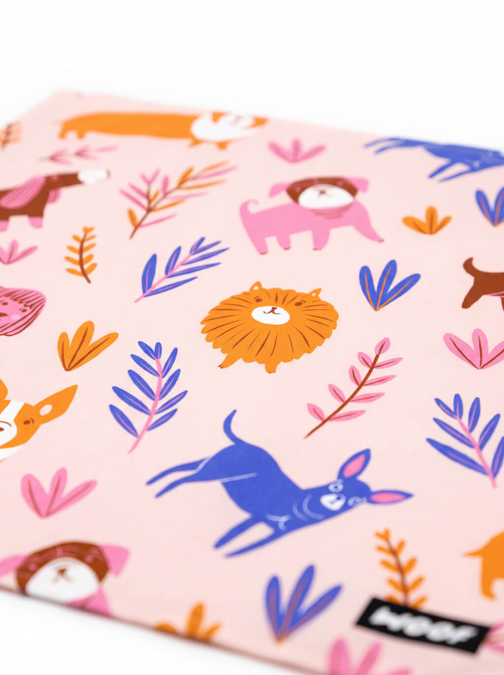 Close up of the print on the beige Boho Doggy Paradise Bandana from WOOF