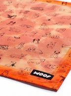 Close up of the tie dye pattern on the orange dog bandana from WOOF