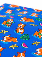 Close up of the tropical print on the blue corgi dog bandana from WOOF