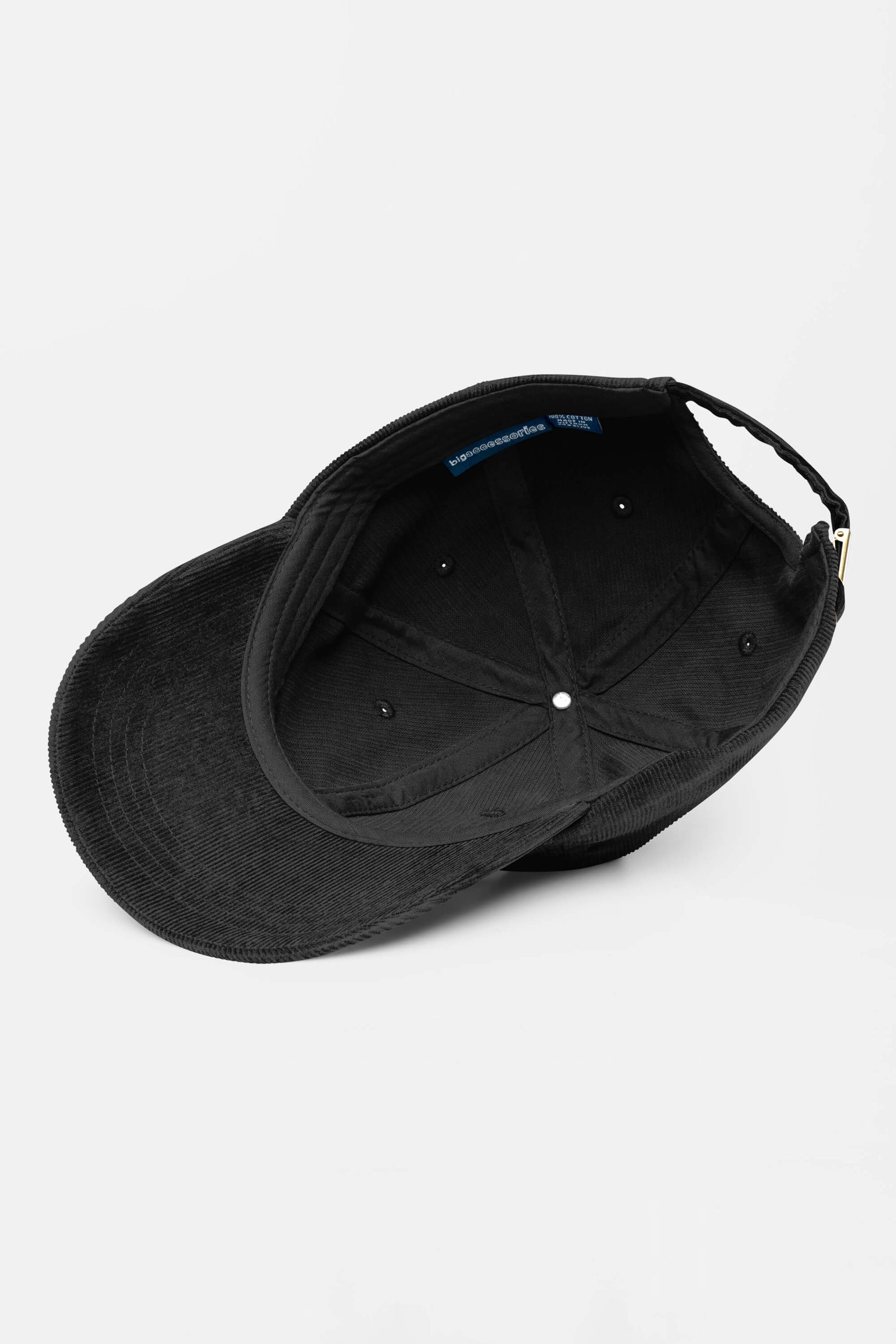 The Limited Dog Lover Corduroy Cap from Dogloverclothing.com is displayed from above, showing its interior stitching, adjustable back strap, and corduroy texture. The cap is set against a plain white background.