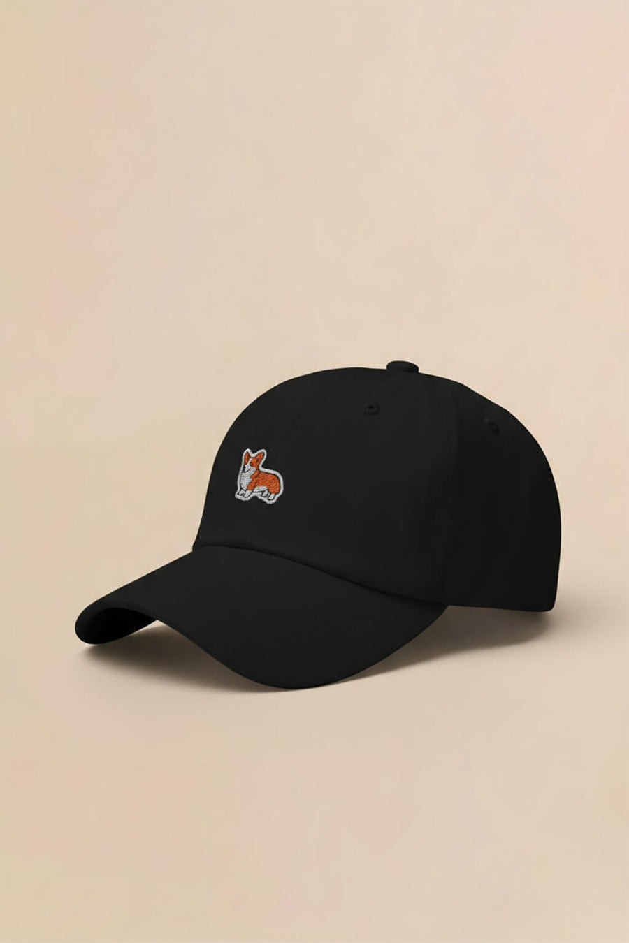 Black Iconic Corgi Baseball Cap from WOOF, front view of the embroidery