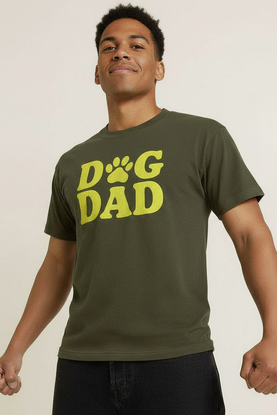 Front of the green Soft Dog Dad T-Shirt from WOOF on a plain background