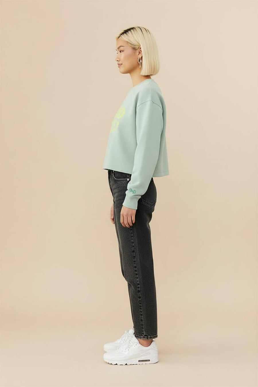 Mint green Good Girl Crop Sweatshirt from WOOF seen from the opposite side
