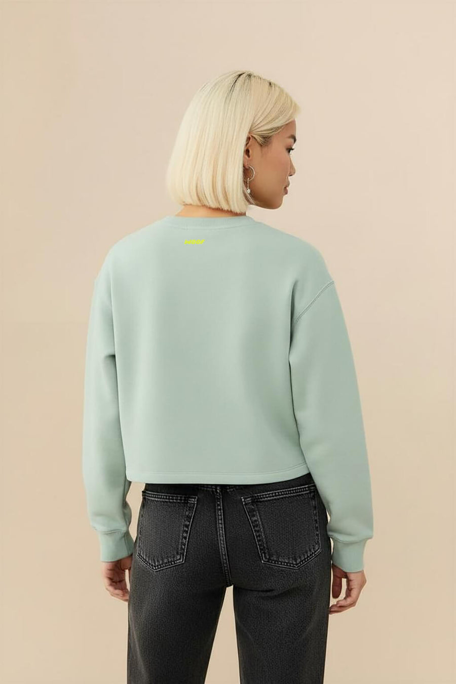 Back view of the mint green Good Girl Crop Sweatshirt from WOOF