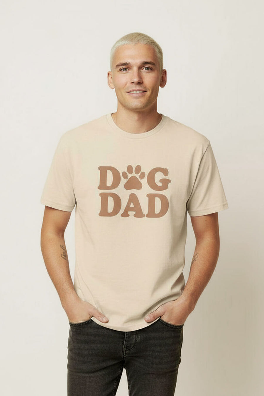 Beige Soft Dog Dad T-Shirt from WOOF, front view with the Dog Dad print