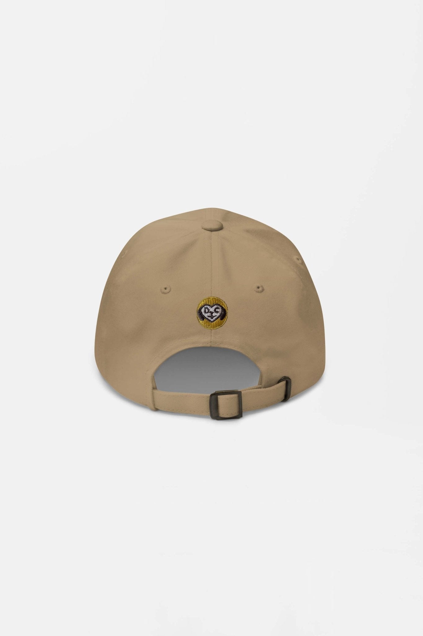 The Iconic Corgi Cap from Dogloverclothing.com is a beige baseball cap with an adjustable strap and a cute corgi face patch above the back opening—ideal for dog lovers and hat enthusiasts alike.