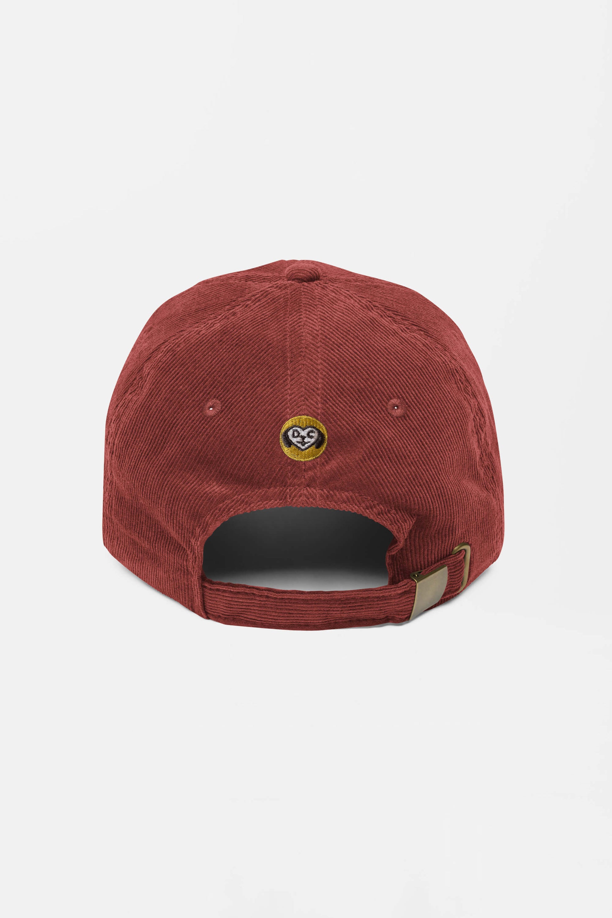 The Limited Dog Lover Corduroy Cap from Dogloverclothing.com is shown from the back in rust color, featuring a metal adjustable strap and a small circular decorative patch above the opening.
