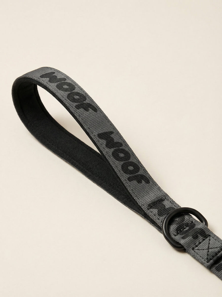 Hardware detail on the all black WOOF collar and leash set