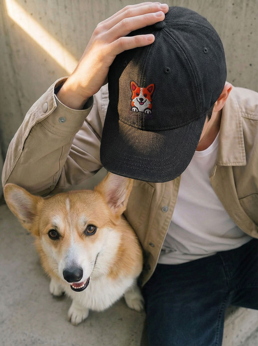 Black denim Iconic Corgi Cap from WOOF, front view of the embroidery