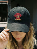Black Dachshund embroidered denim cap from WOOF, front view
