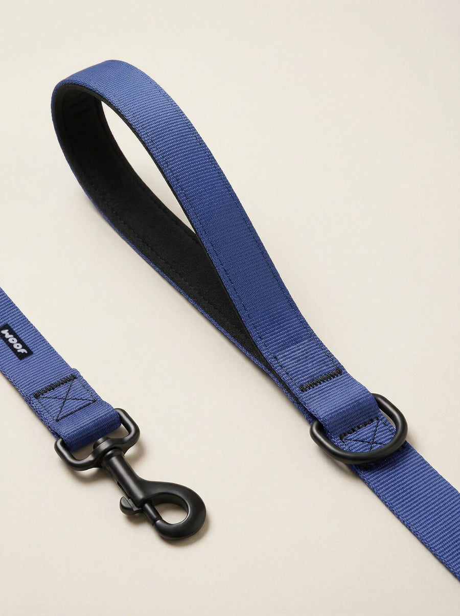 Hardware detail on the deep blue dog collar and leash set from WOOF