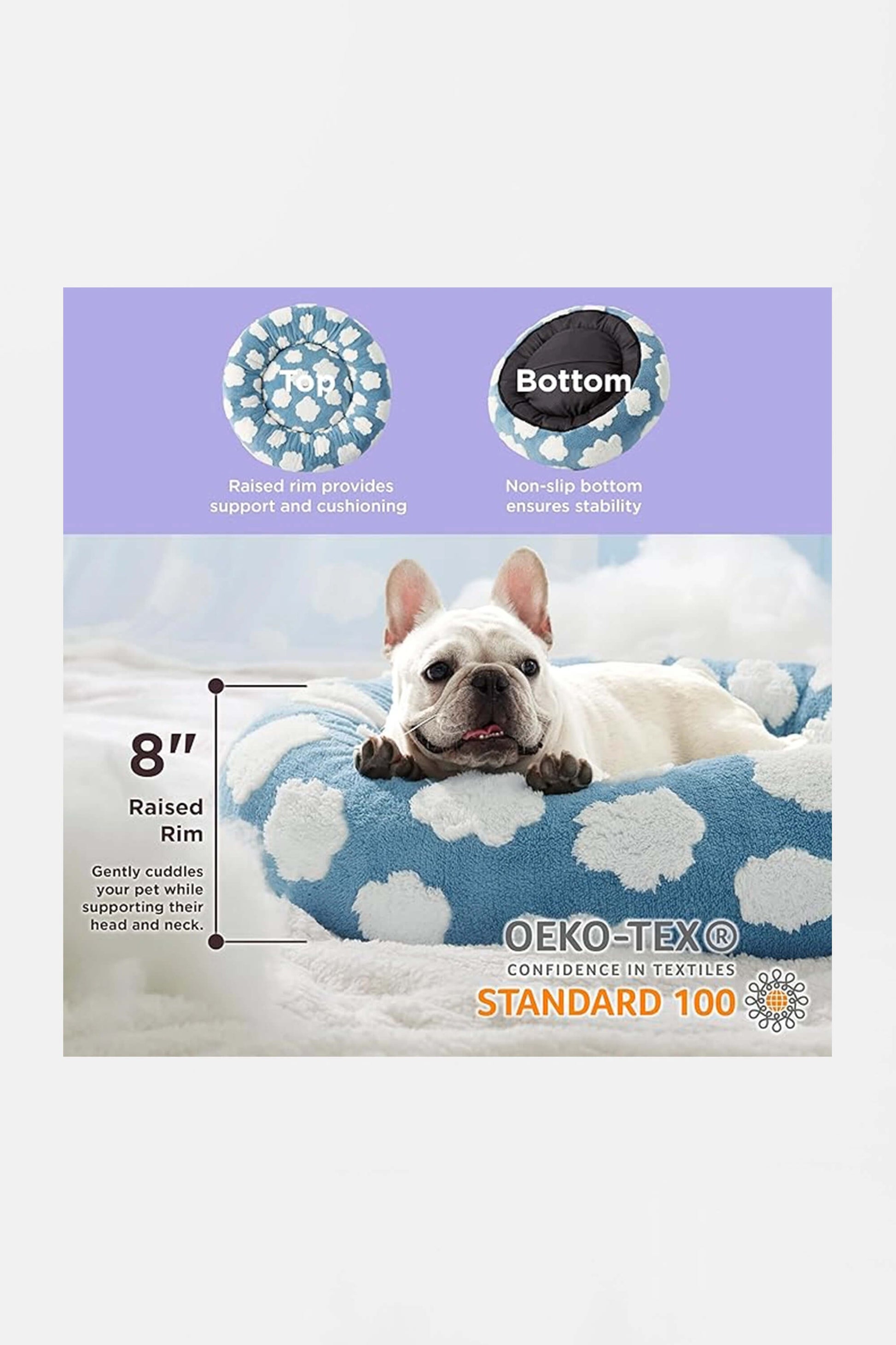 A French Bulldog rests on the Amazon Super Soft Cloud Dog Bed 30, featuring a blue and white design. It includes an 8 raised rim for support, non-slip bottom for stability, and OEKO-TEX Standard 100 certification for fabric safety.
