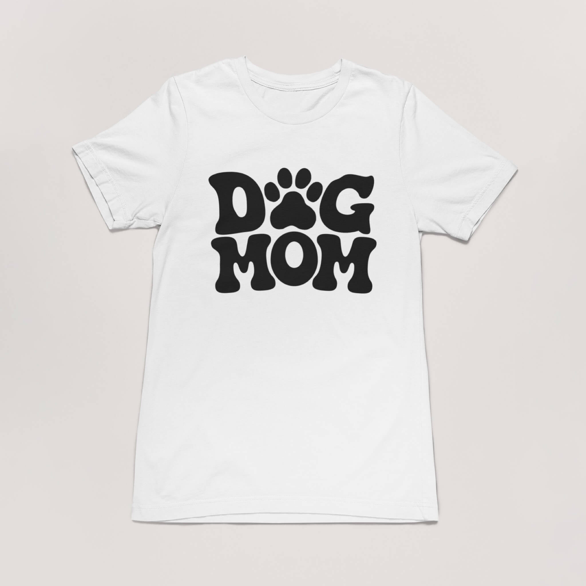 The Dogloverclothing.com Dog Mom T-shirt features playful black text with a paw print as the O. Ideal for dog lovers, it stands out on white and pairs well with our dog bandanas.