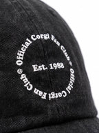 Close up of the front embroidery on the black Official Corgi Fan Club Cap from WOOF