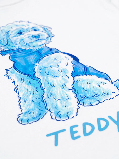Close up of the hand drawn caricature on the white T-Shirt from WOOF