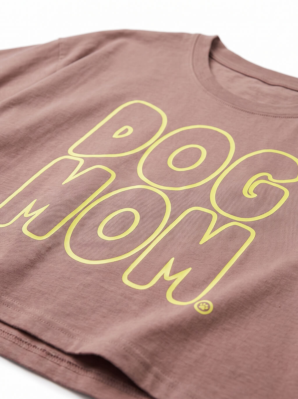 Close up of the Dog Mom print on the brown crop top from WOOF