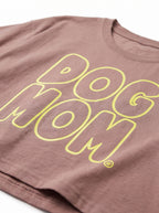 Close up of the Dog Mom print on the brown crop top from WOOF