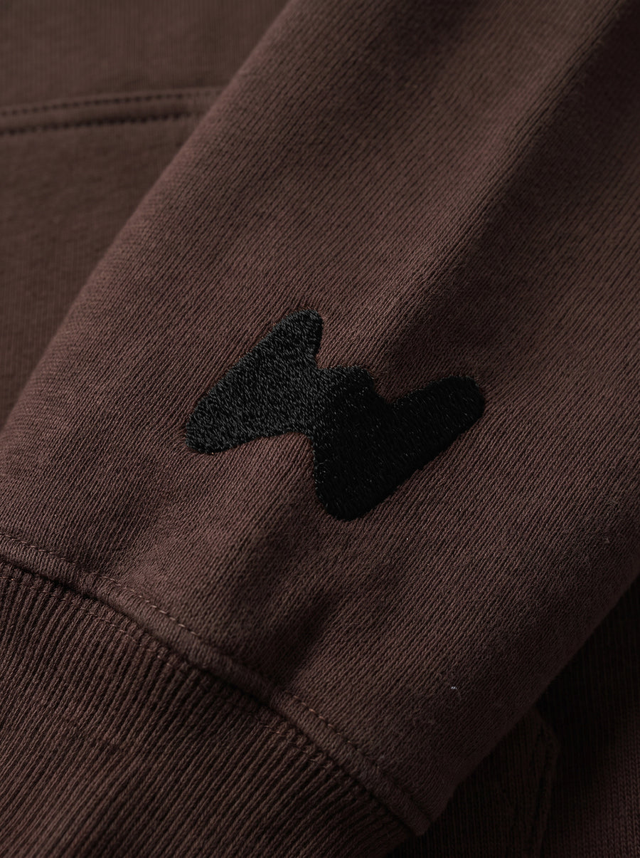 Close up of the print on the brown No Structure Dog Hoodie from WOOF