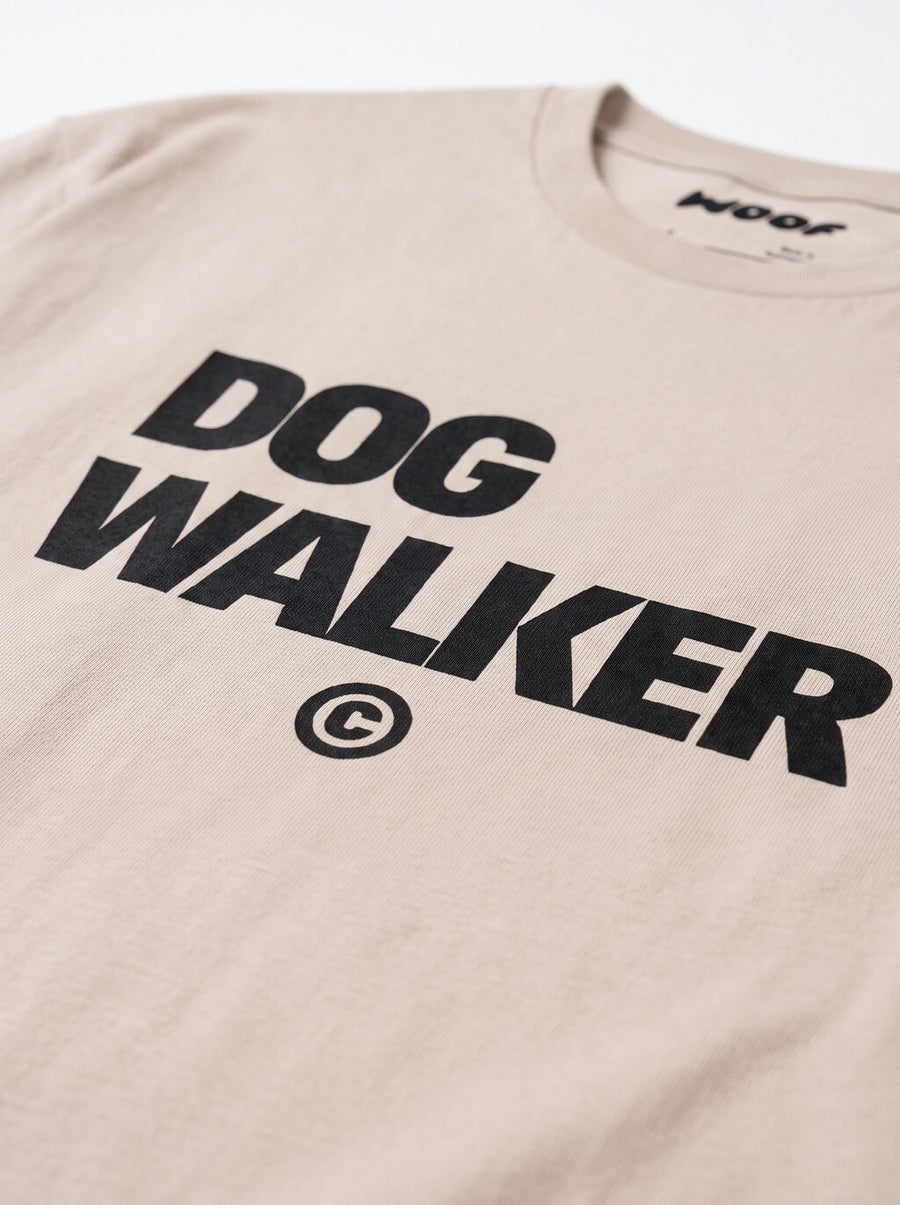 Close up of the print on the beige Dog Walker T-Shirt from WOOF