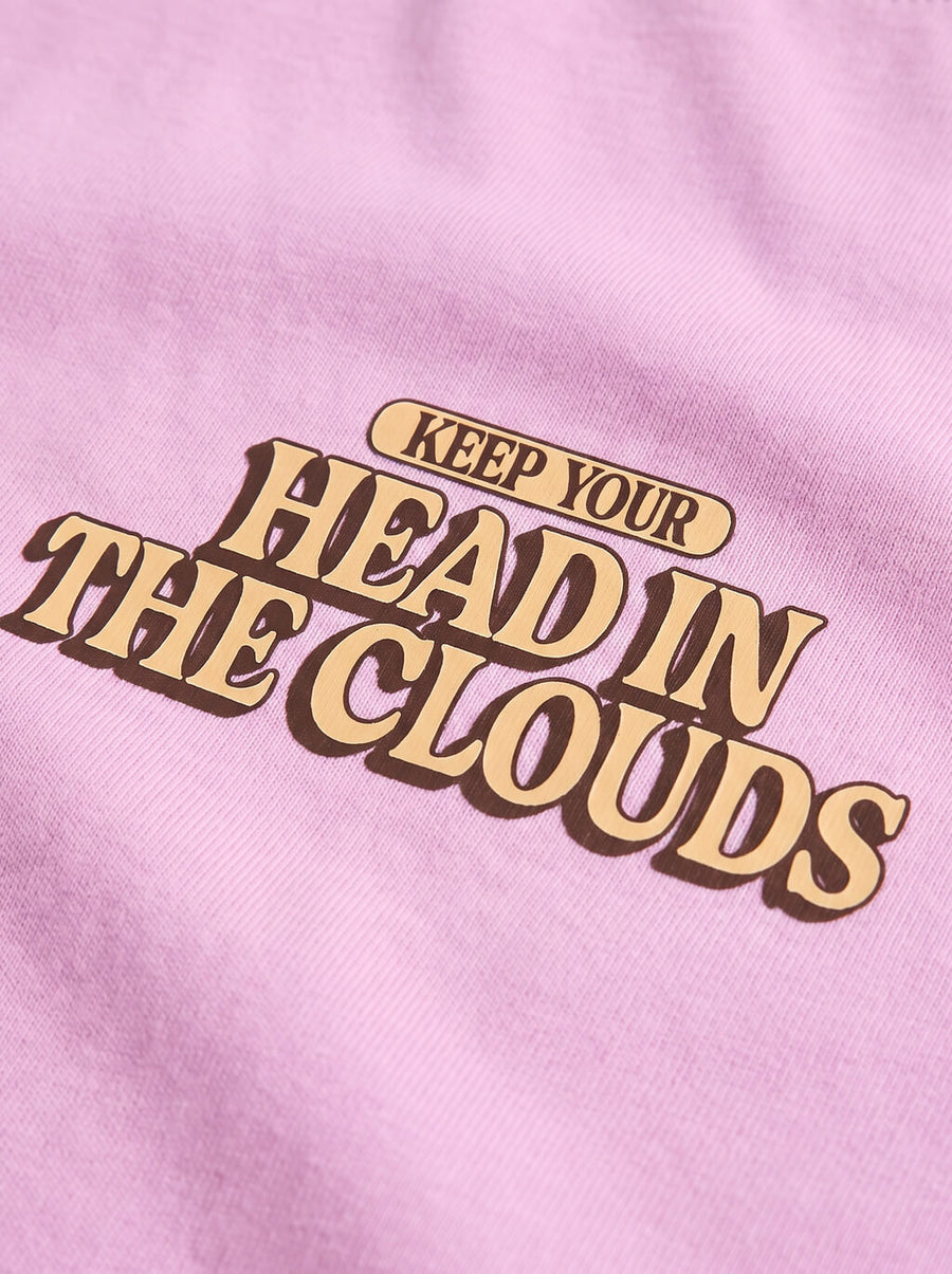 Close up of the front print on the lilac Head in the Clouds Dog T-Shirt from WOOF