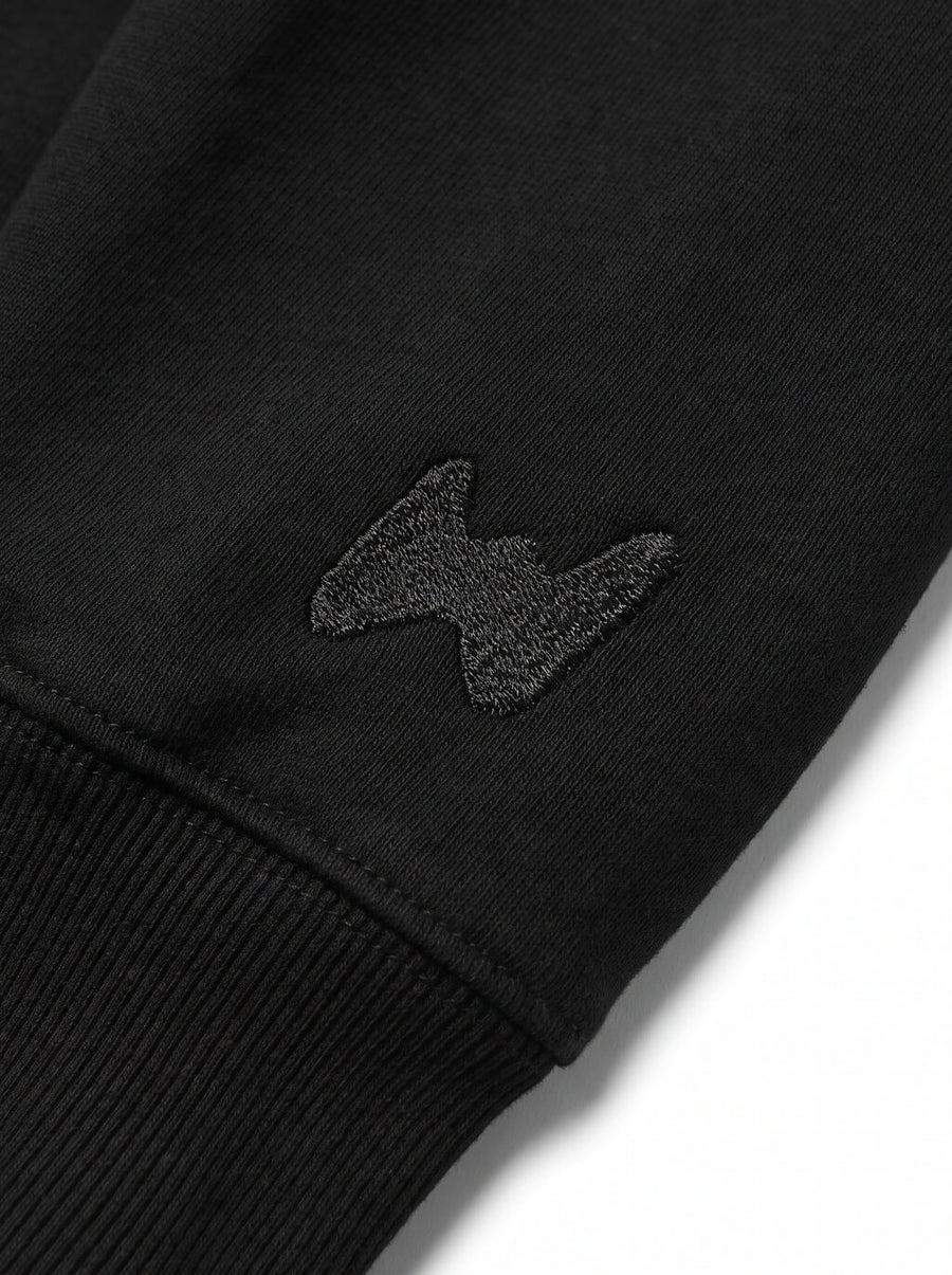 Close up of the lettering on the black Good Boy Dog Sweatshirt from WOOF