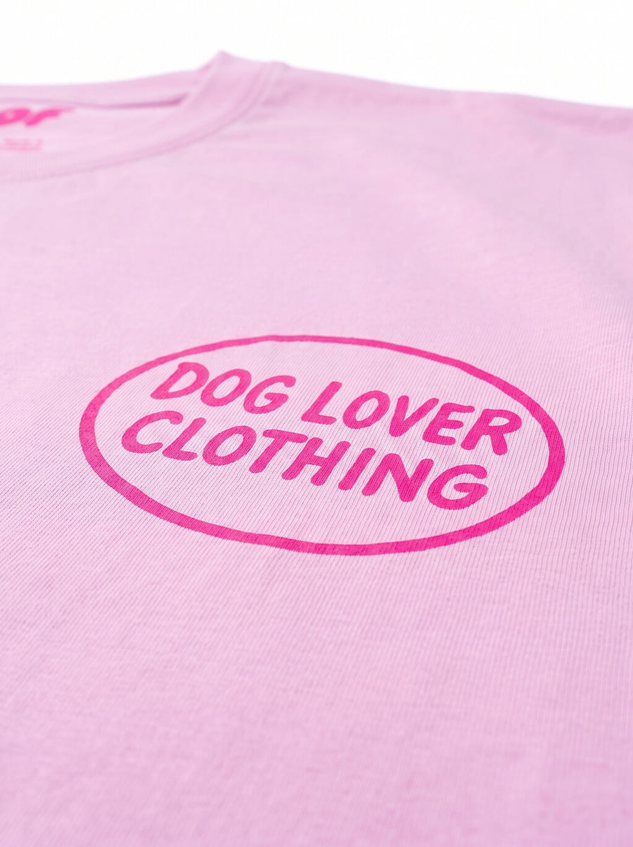 Close up of the front print on the pink Life is Better with a Dog T-Shirt from WOOF