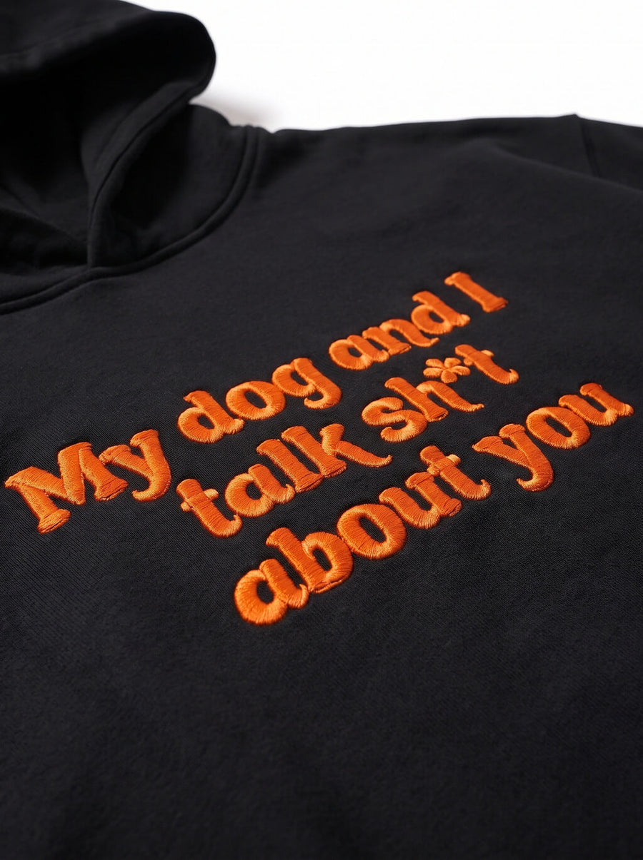 Close up of the embroidery on the black My Dog And I Talk Hoodie from WOOF