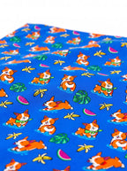 Fabric detail on the blue Tropical Corgi Paradise Dog Bandana from WOOF